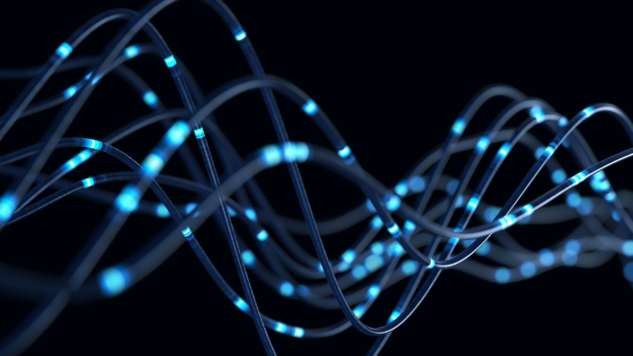 blue strips of lights conveyed on a black background representing data flow